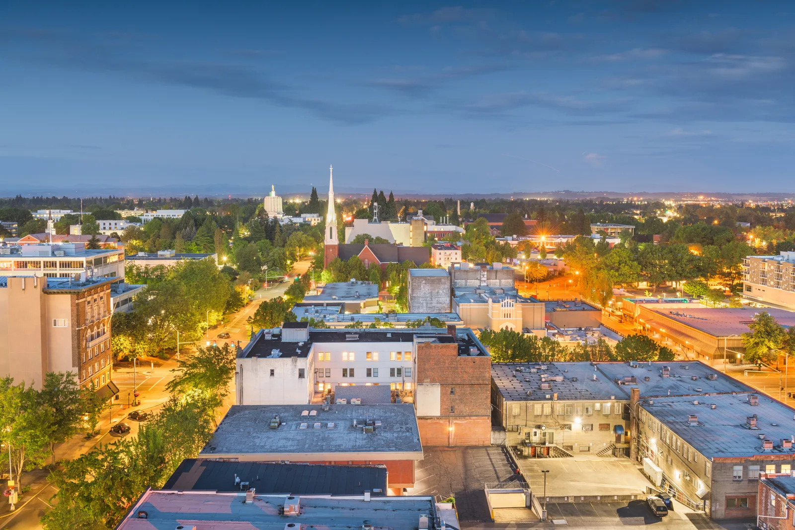 An aerial cityscape of Salem, Oregon highlighting municipal building and civic infrastructure.