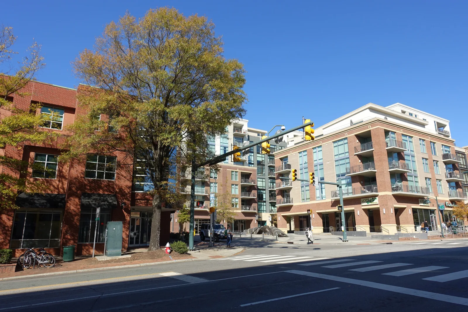 A downtown intersection showcasing Chapel Hill's commitment to pedestrian mobility and multimodal infrastructure.