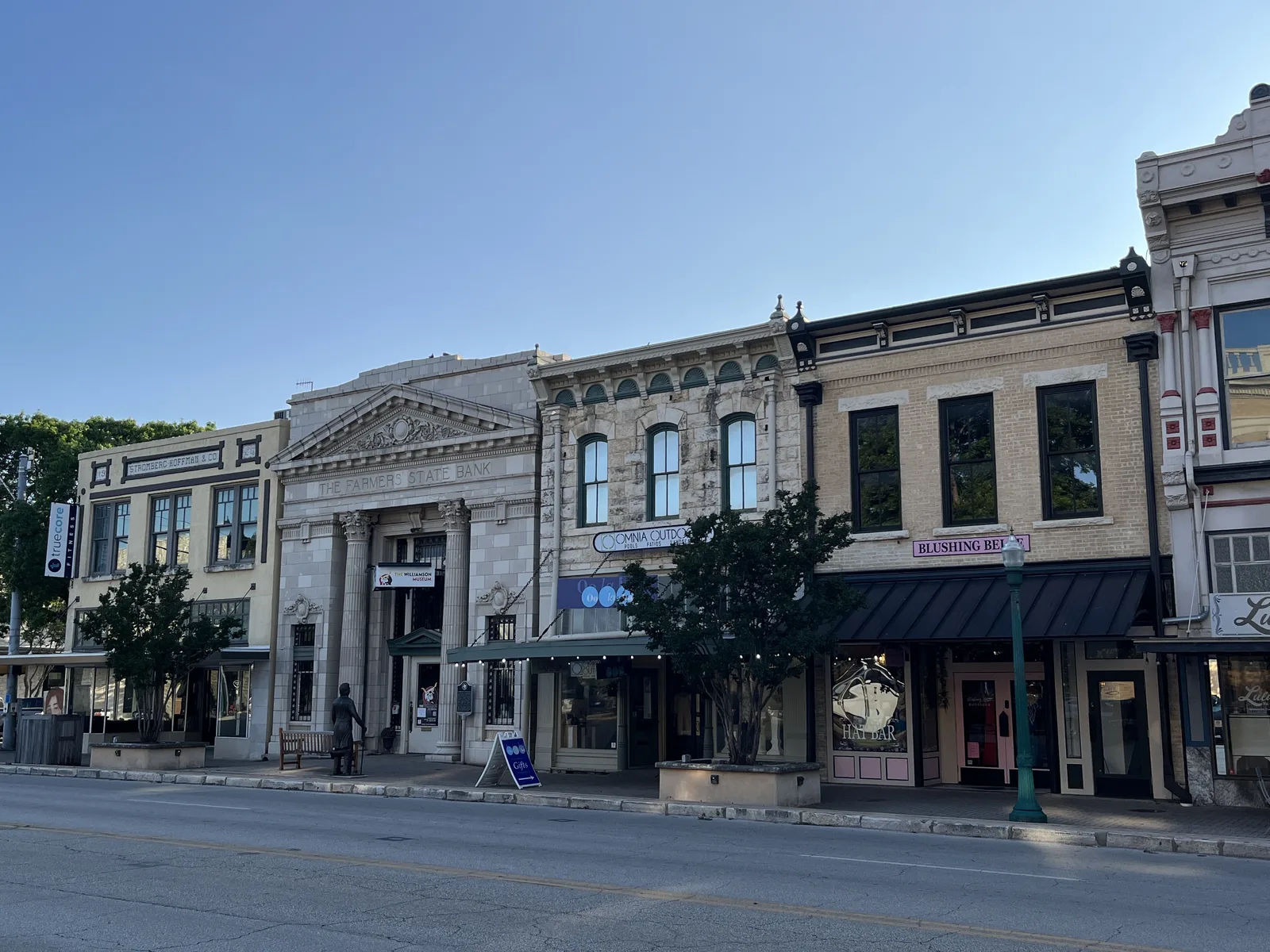 A downtown streetscape in Georgetown, Texas, illustrating municipal roadway and commercial infrastructure.